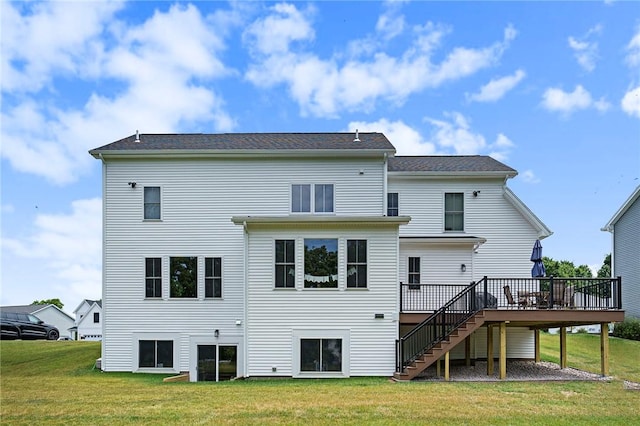 108 Chase Meadow Trl, Mendon, NY 14472 - back of property with stairway, a deck, and a lawn