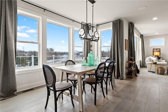 108 Chase Meadow Trl, Mendon, NY 14472 - dining area featuring a chandelier, light wood-style flooring, healthy amount of natural light, recessed lighting, and baseboards