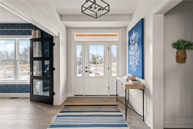 108 Chase Meadow Trl, Mendon, NY 14472 - entrance foyer featuring wood-type flooring and baseboards