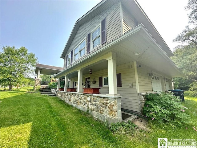 9983 Deer Creek Rd, Genesee, NY 14770 - view of side of home featuring covered porch and a lawn