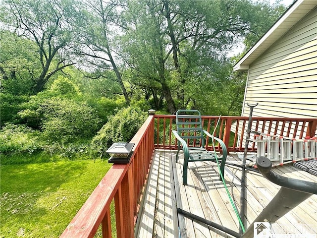 9983 Deer Creek Rd, Genesee, NY 14770 - wooden deck with a lawn