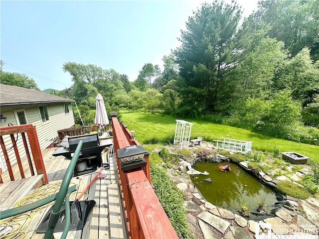 9983 Deer Creek Rd, Genesee, NY 14770 - wooden terrace with a small pond and a grill