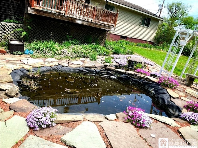 9983 Deer Creek Rd, Genesee, NY 14770 - exterior view of a garden pond