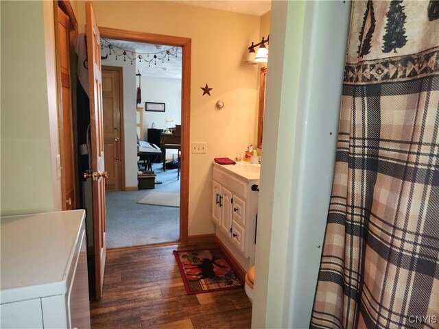 381 French Rd, Morehouse, NY 13324 - bathroom with vanity, wood finished floors, and baseboards