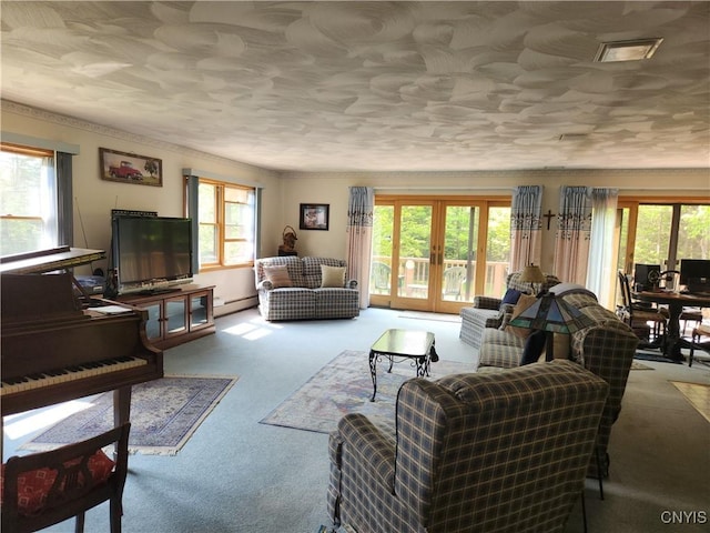 381 French Rd, Morehouse, NY 13324 - carpeted living room with french doors, baseboard heating, and crown molding