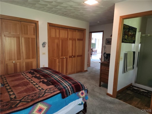 381 French Rd, Morehouse, NY 13324 - carpeted bedroom with multiple closets and baseboards