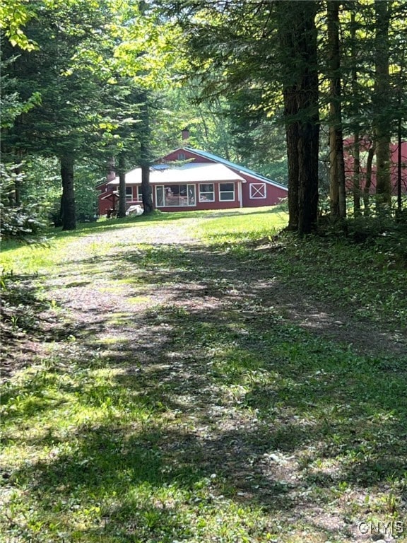 381 French Rd, Morehouse, NY 13324 - view of yard featuring a wooded view