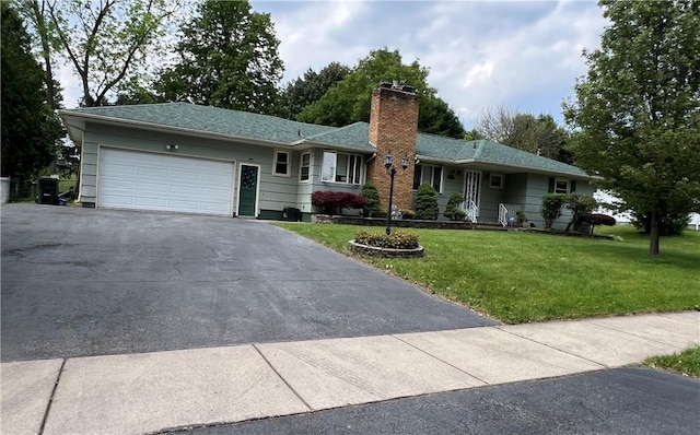 793 Helendale Rd, Irondequoit, NY 14609 - ranch-style house featuring a chimney, driveway, a garage, a front yard, and roof with shingles