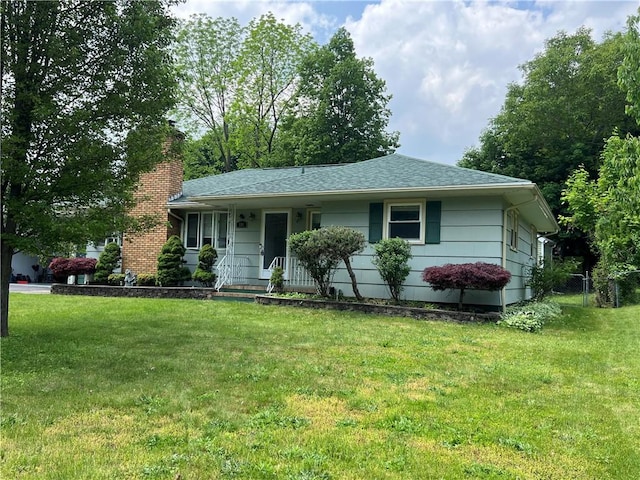 793 Helendale Rd, Irondequoit, NY 14609 - ranch-style house with a chimney and roof with shingles