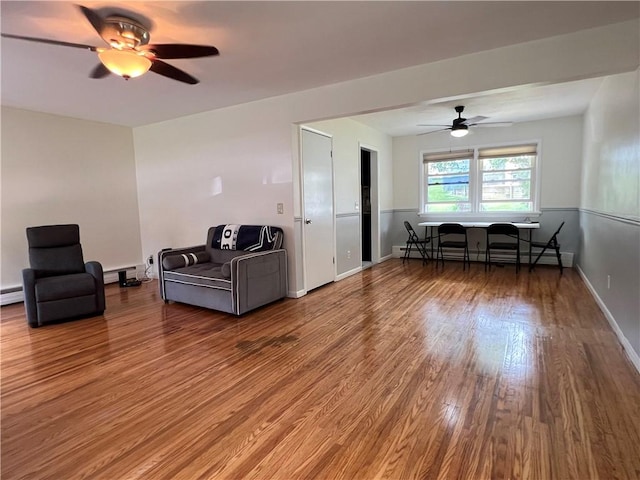 793 Helendale Rd, Irondequoit, NY 14609 - living room with ceiling fan, wood finished floors, and a baseboard radiator