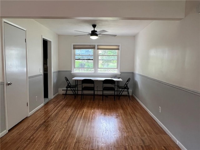793 Helendale Rd, Irondequoit, NY 14609 - dining space featuring a ceiling fan, wood finished floors, a baseboard heating unit, and baseboards