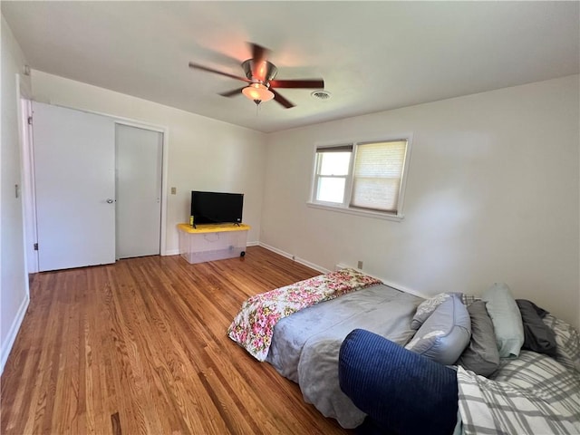 793 Helendale Rd, Irondequoit, NY 14609 - bedroom with light wood-type flooring, baseboards, and a ceiling fan