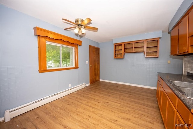965 Walden Ave, Buffalo, NY 14211 - kitchen featuring baseboard heating, light wood-style floors, a sink, and open shelves