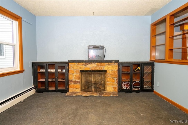 965 Walden Ave, Buffalo, NY 14211 - unfurnished living room featuring a baseboard heating unit, carpet floors, and a fireplace
