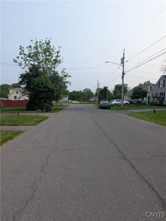 311 Raphael Ave, Salina, NY 13211 - view of asphalt street featuring street lights and a residential view