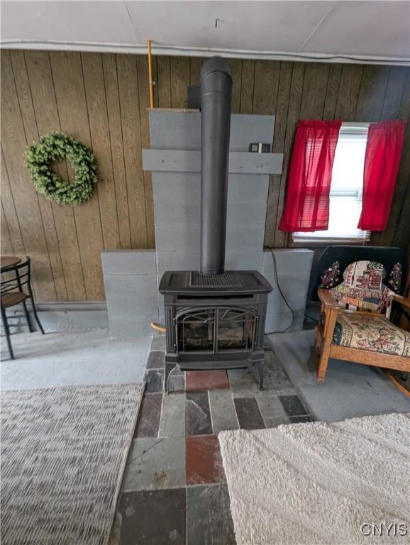 311 Raphael Ave, Salina, NY 13211 - detailed view of wooden walls and a wood stove
