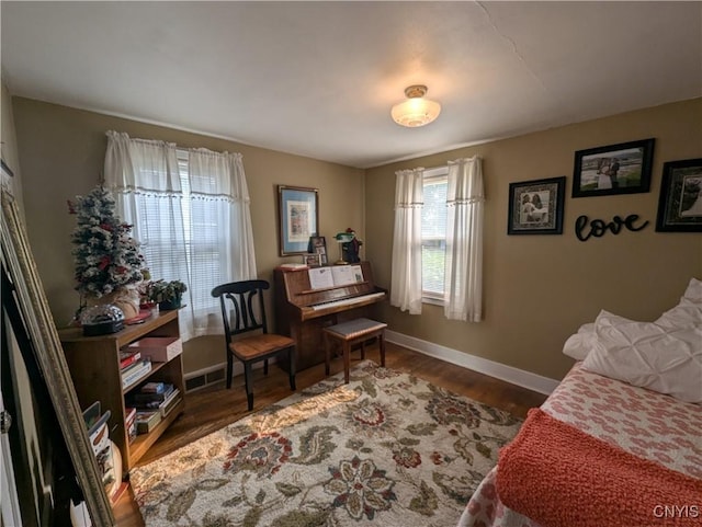 311 Raphael Ave, Salina, NY 13211 - living area featuring baseboards and wood finished floors