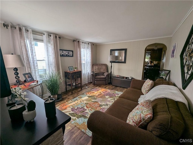 311 Raphael Ave, Salina, NY 13211 - living area with plenty of natural light, arched walkways, wood finished floors, and ornamental molding