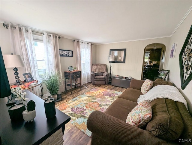 311 Raphael Ave, Salina, NY 13211 - living area with arched walkways, wood finished floors, and crown molding