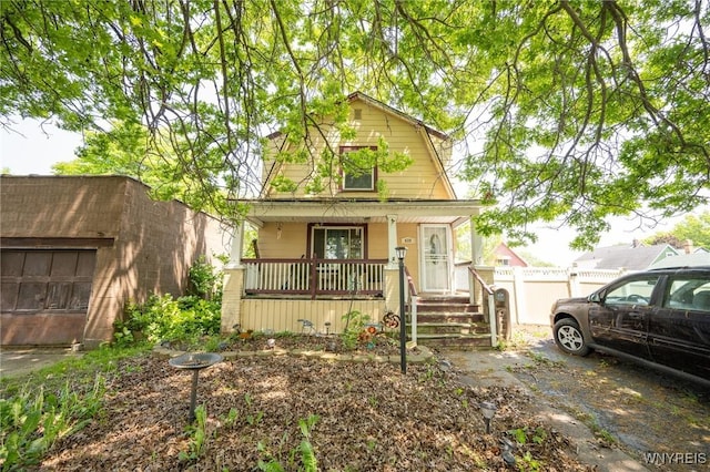 639 36th St, Niagara Falls, NY 14301 - colonial inspired home featuring covered porch and a gambrel roof