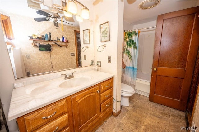 639 36th St, Niagara Falls, NY 14301 - bathroom featuring a ceiling fan, vanity, toilet, and shower / bath combination with curtain