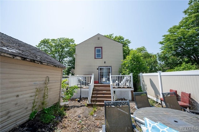 639 36th St, Niagara Falls, NY 14301 - rear view of property featuring outdoor dining space, a deck, and a patio