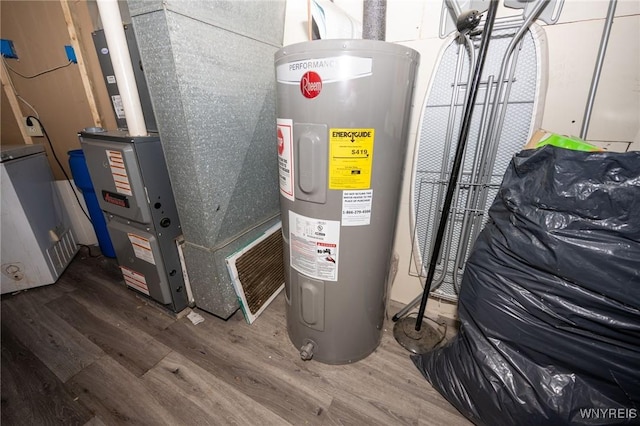 639 36th St, Niagara Falls, NY 14301 - utility room with electric water heater and heating unit