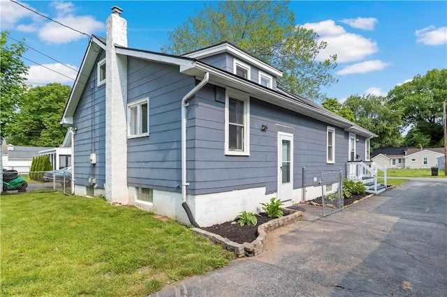 43 Hager Rd, Greece, NY 14616 - view of front of house featuring a chimney