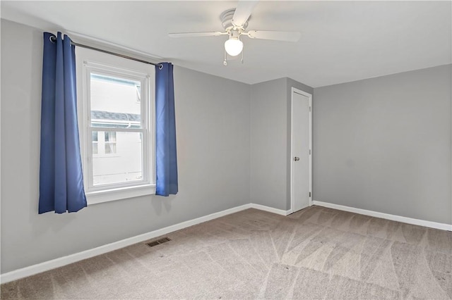 43 Hager Rd, Greece, NY 14616 - carpeted empty room with baseboards and a ceiling fan