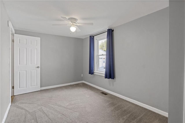 43 Hager Rd, Greece, NY 14616 - spare room featuring ceiling fan, carpet, and baseboards