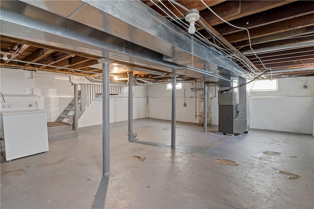 43 Hager Rd, Greece, NY 14616 - below grade area featuring washer / dryer, heating unit, stairway, and gas water heater