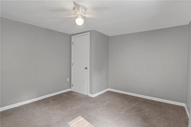 43 Hager Rd, Greece, NY 14616 - empty room with carpet, a ceiling fan, and baseboards