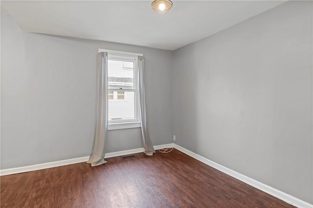 43 Hager Rd, Greece, NY 14616 - empty room with dark wood-style floors and baseboards