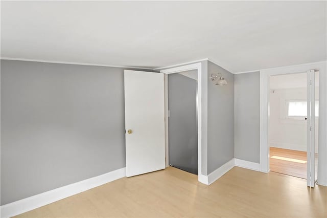 43 Hager Rd, Greece, NY 14616 - unfurnished bedroom with light wood-style flooring and baseboards