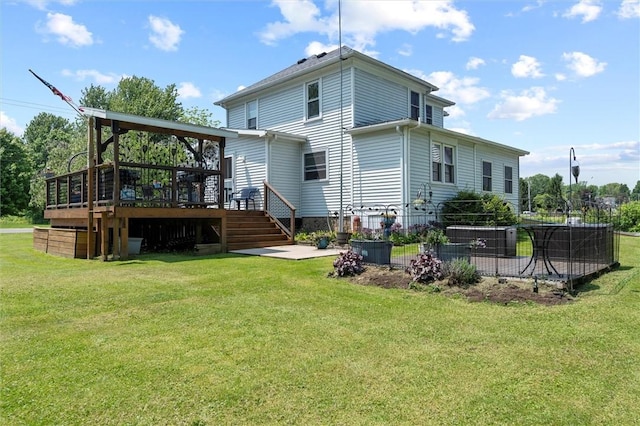 13385 Seneca St, Savannah, NY 13146 - back of house with a deck, a lawn, stairway, and central AC