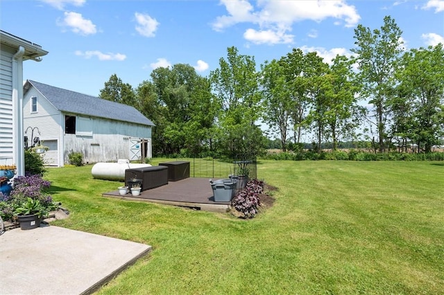 13385 Seneca St, Savannah, NY 13146 - view of grassy yard with a deck and an outbuilding