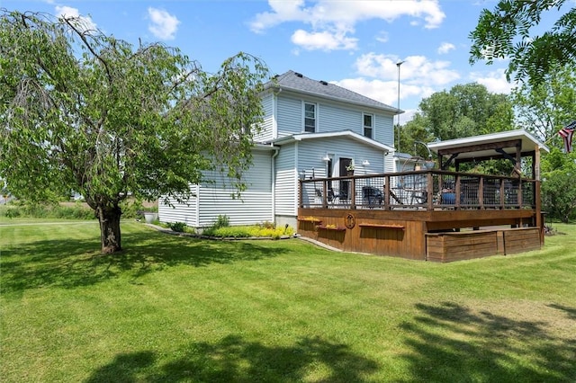 13385 Seneca St, Savannah, NY 13146 - rear view of property with a wooden deck and a lawn