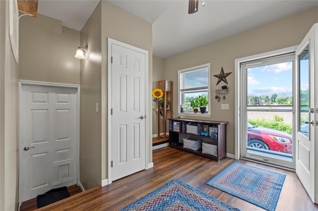 13385 Seneca St, Savannah, NY 13146 - entrance foyer with wood finished floors, baseboards, and ceiling fan