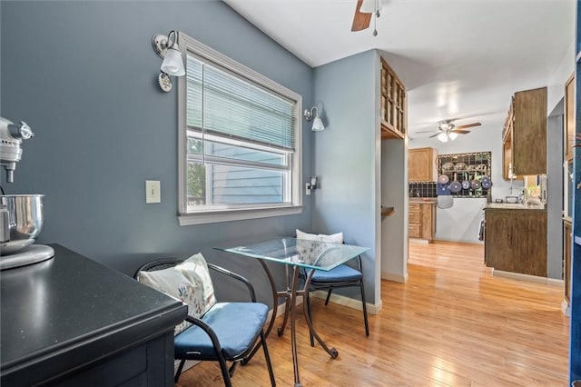 13385 Seneca St, Savannah, NY 13146 - sitting room featuring a ceiling fan and light wood-style floors