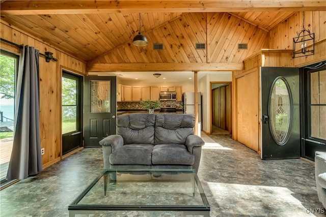 4859 Becker Ln, Lyme, NY 13693 - living area with lofted ceiling, wood walls, concrete flooring, and wooden ceiling