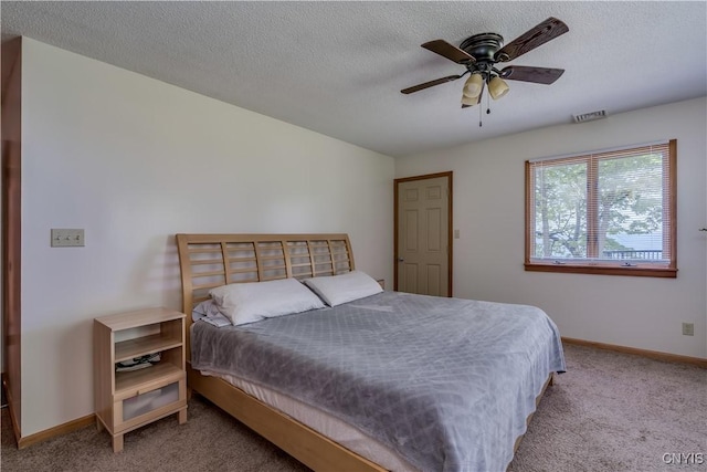 4859 Becker Ln, Lyme, NY 13693 - carpeted bedroom featuring baseboards, a ceiling fan, and a textured ceiling