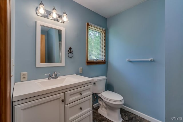 4859 Becker Ln, Lyme, NY 13693 - bathroom featuring baseboards, vanity, and toilet