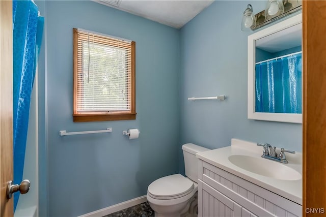 4859 Becker Ln, Lyme, NY 13693 - full bathroom featuring toilet, vanity, baseboards, and curtained shower