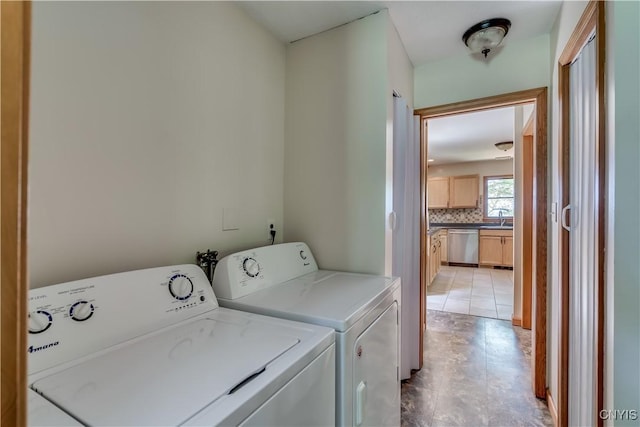 4859 Becker Ln, Lyme, NY 13693 - laundry area with independent washer and dryer and light tile patterned floors