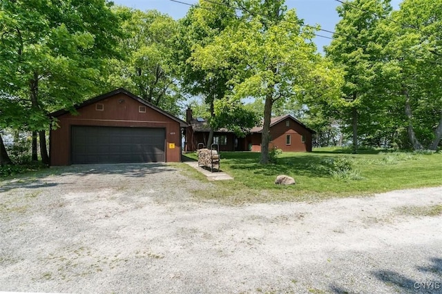 4859 Becker Ln, Lyme, NY 13693 - ranch-style house featuring a garage, a front yard, and driveway