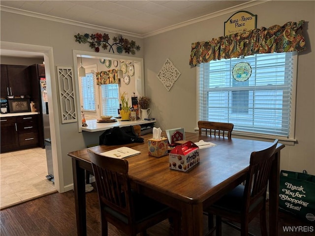 130 S 6th St, Olean-City, NY 14760 - dining space featuring crown molding and light wood finished floors