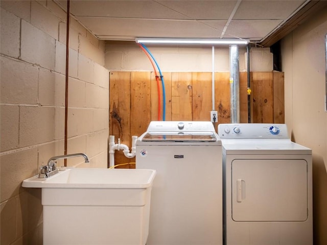 257 Longridge Ave, Greece, NY 14616 - laundry area with washing machine and clothes dryer and concrete block wall