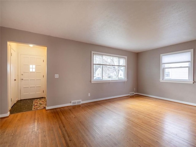 257 Longridge Ave, Greece, NY 14616 - entrance foyer with light wood-type flooring and baseboards