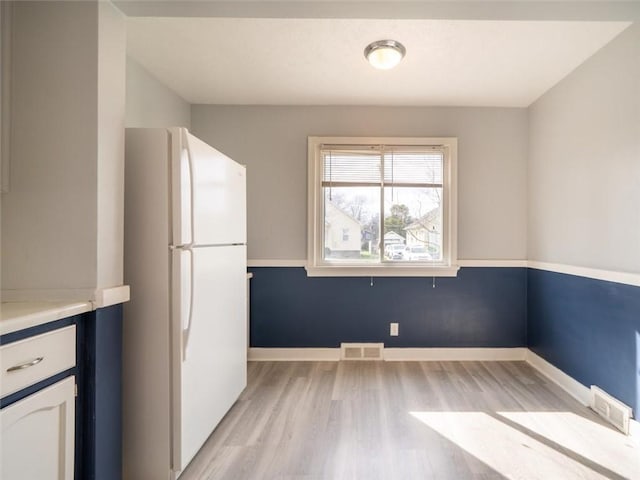 257 Longridge Ave, Greece, NY 14616 - unfurnished dining area featuring light wood-style flooring and baseboards