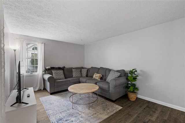 11 Shadow Ln, Gates, NY 14606 - living room featuring wood finished floors, a textured ceiling, and baseboards